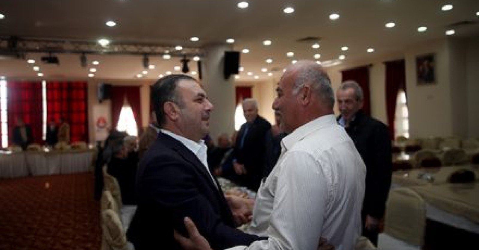BAŞKAN ERCAN MUHTARLARLA KOL KOLA